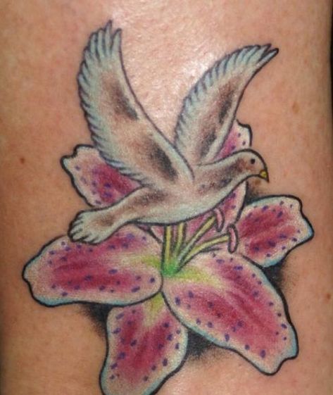 Dove and pink lily tattoo Dove Flower Tattoo, Pink Lily Tattoo, Lily Arm Tattoo, Dove Tattoo Ideas, Tiger Lily Tattoos, Colorful Flower Tattoo, Lily Tattoo Design, Lily Flower Tattoos, Dove Tattoos