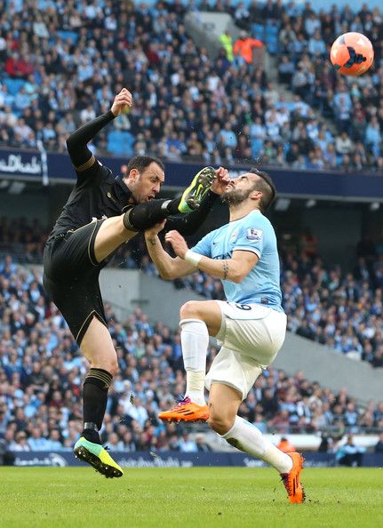 Ivan Ramis of Wigan Athletic against Alvaro Negredo of Manchester City Wigan Athletic, Football Life, Soccer Life, Sport Soccer, Manchester City, Premier League, How To Look Pretty, Manchester, Soccer