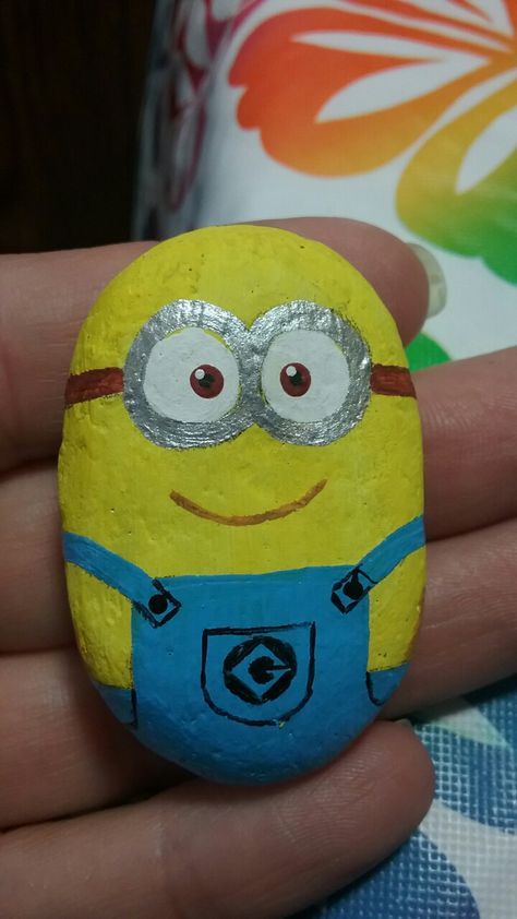 Minion painted rock- kindness rocks project Minion Rock Painting, Minion Painting, Minion Rock, Kindness Rocks Project, Kindness Rocks, Painted Rock, Wood Slices, Rock Painting, Painted Rocks