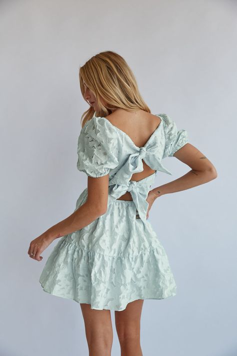 You'll look simply stunning in the Whitley Tie Back Puff Sleeve Babydoll Mini Dress! This feminine babydoll dress features a chic floral design, square neckline, tiered skirt, and two back tie details. Pair with a classic heel to finish off the look! Details Shell: 70% Nylon, 30% Polyester Lining: 100% Polyester Side pockets Elastic band on sleeves Elastic band on back Hand wash cold Sorority Dresses, Rush Outfits, Sorority Rush, Dance Stuff, Babydoll Mini Dress, Rush Dresses, School Dance, Linen Mini Dress, Blue Back