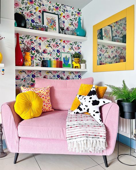 Bringing sunshine indoors ☀️💖 ⁠ ⁠ Dive into a burst of color with our Dhadit Stripe Throw and Angeles Floral Velvet Cushion! 🎨✨ ⁠ ⁠ Courtesy of @hilaryscolourfulhome, because life's too short for dull decor! 🌈⁠ ⁠ 🔍 Dhadit Stripe Throw⁠ Angeles Floral Velvet Cushion Chosen Wallpaper, Colourful Homes, Rainbow Books, Shelves Living Room, Pink Shelves, Alcove Shelving, Wall Shelves Living Room, Retro Pastel, Dopamine Decor