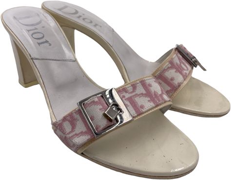 The early 2000's are back in full swing! Feel like you walked straight off a 2003 red carpet in these Dior pink monogram heeled sandals. These feature a pink monogram buckle strap with silver hardware and a lock and key charm with the CD logo on each shoe. These shoes are in great vintage condition with some wear to the soles.Details:Size: 37Heel size: 3.5"Canvas monogram strapMade in Italy Dior Pink Monogram, Dior Heels, Dior Shop, Dior Pink, Dior Sandals, Pink Monogram, Lock And Key, Pretty Shoes, Dream Shoes