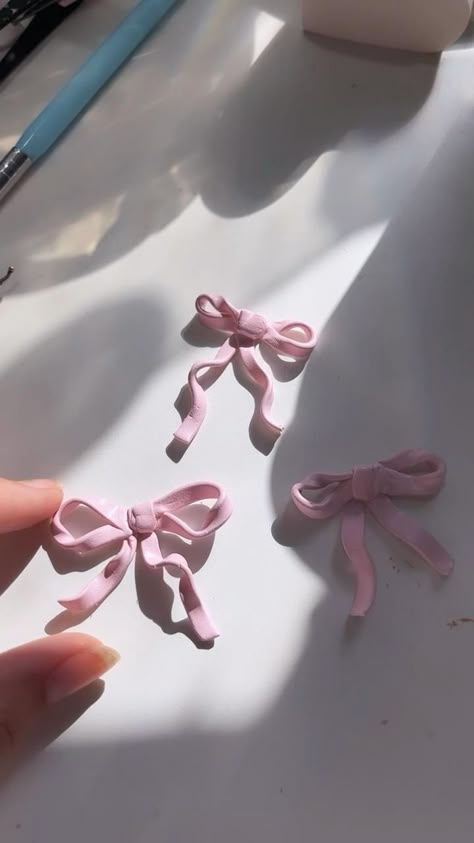 handmade polymer clay miniature 3cm ribbon bows in baby pink Ballet Gifts Diy, Ballet Diy Crafts, Elegant Clay Jewelry, How To Make Clay Bow, How To Make A Bow With Clay, Ceramic Gift Ideas Diy, Pink Clay Crafts, Air Dry Clay Ideas Jewelry, Molded Clay Ideas