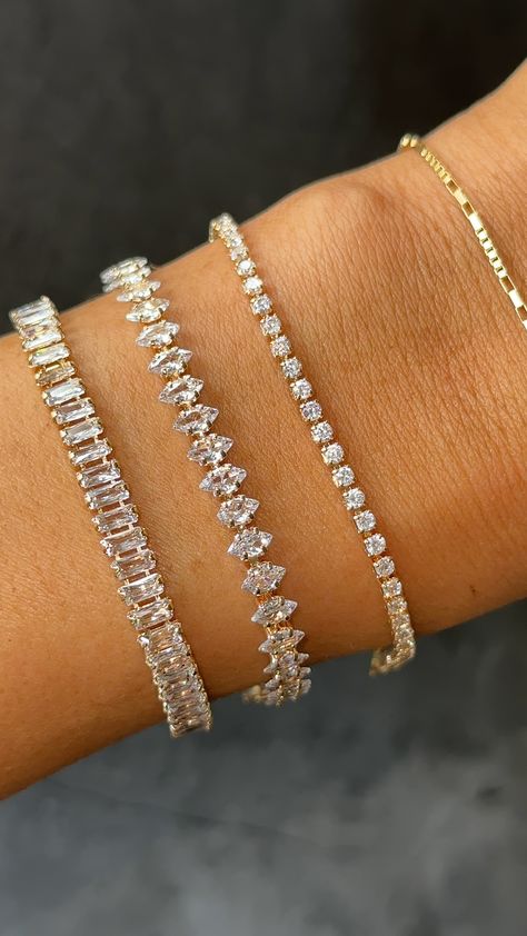 This timeless tennis bracelet was designed to fit seamlessly into your everyday stack- the petite stones shine in the light while the design remains subtle enough for everyday wear. Crafted with high-quality pavé stones that glimmer like real diamonds, this piece looks just like its expensive diamond counterpart. 14k Gold Plated with pavé stones Length: 6.25" + 2" Ext Please remove this piece prior to any water or sweat exposure, as the integrity and shine of the stones may be compromised by wat Bauble Bar Tennis Bracelet, Pandora Tennis Bracelet Stack, Classic Bracelets Women, Expensive Looking Jewelry, Elegant Bracelet Stack, Timeless Tennis Bracelet, Diamond Tennis Bracelet Stack, Luxury Bracelet Stack, Tennis Bracelet Stack