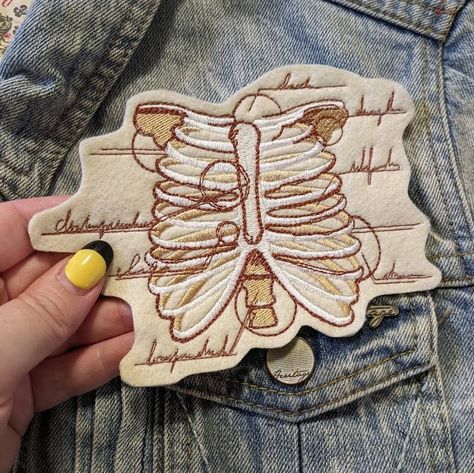 This Listing Is For ONE Vintage Anatomical Ribcage Iron On Patch! The Important Stuff: Dimensions: Approx 15cm x 11.5cm Backing: Iron On Fabric: Felt Thread: 100% Polyester Embroidered By: The Craft Rebellion in Brisbane, Australia. The Production Stuff:  Due to the handmade nature of these items and that we make them to order, our production time can vary from 5 business days to up to 3-4 weeks. This is the time it takes for us to create your patches once you have placed your order. It does not Anatomical Ribcage, Cool Embroidery, Felt Patch, Iron On Fabric, Cool Patches, Vintage Patches, Embroidered Applique, Brisbane Australia, Fabric Patch