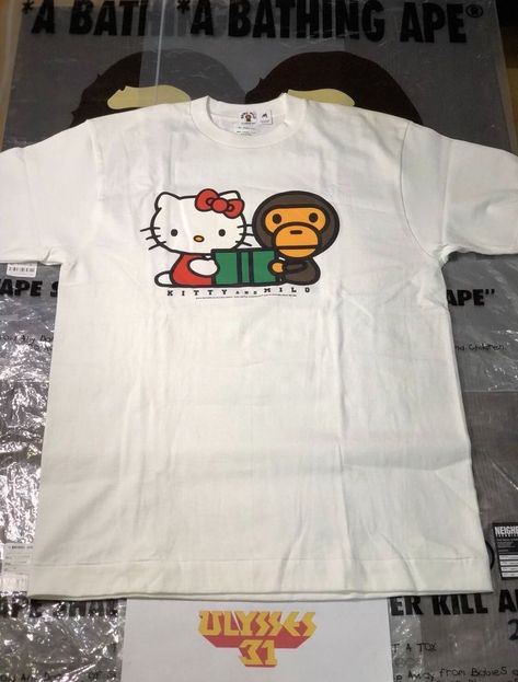 BAPE Tee BABY MILO HELLO KITTY T-Shirt Authentic #BAPE #GraphicTee Hello Kitty Baby Tee, Bape Shirt Outfit, Bape Hello Kitty, Bape X Hello Kitty, Bape Tshirt, Hello Kitty Fashion, Bape Tee, Hello Kitty Shirt, Bape T Shirt