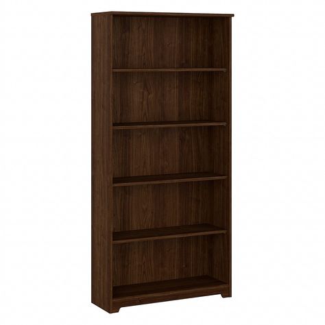 PRICES MAY VARY. Engineered Wood Sold as 1 Each. Tall bookcase made of laminate over engineered wood in modern walnut finish. Three adjustable shelves for flexible storage and display and two fixed shelves for added stability. Assembled dimensions: 66.3"H x 31.38"W x 11.54"D. Each shelf supports up to 25 lbs. so you can confidently store paperback and hardcover books along with decorations. Assembly required. Five-shelf bookcase matches the height of a Cabot desk with hutch (sold separately) for Bookcase Modern, Tall Shelves, Tall Bookshelves, Tall Bookcase, Office Storage Solutions, Desk With Hutch, Stable Design, Modern Bookshelf, 5 Shelf Bookcase