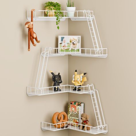 PRICES MAY VARY. 【SPACE SAVING CORNER SHELF】Designed for tight spaces, this corner wall shelf effectively utilizes the corner area of the room, not only saving space but also adding an element of interest to any room. The tiered shelves can hold a variety of items such as figurines, decorative objects, knick-knacks, plants, small books or other items. 【EXQUISITE METAL LADDER SHELF】Our New York inspired metal ladder shelf features premium quality hardware and exquisite details. Its four-tiered la Curved Corner Shelves, Room Objects Decor, Small Cute Shelves, Desk Wall Shelves, Lustigt Wall Shelf Ideas, Cute Wall Shelves, New York City Apartment Decor, Makerspace Crafts, Staircase Shelves