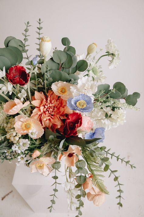 Stunning artificial peonies, eucalyptus, and mini daisies create a romantic beauty perfect for an intimate moment! This gorgeous faux floral bouquet is made with peonies and mini daisies with eucalyptus. They are perfectly finished with (ribbon or paper). Who said that artificial flowers aren’t as elegant as fresh? Artificial flowers are beautiful, and they stay fresh all season! You can have gorgeous blooms on your wedding day or any special occasion, be it anywhere in the world! Dimensions: Br September Wedding Bouquets, Wedding Color Ideas Summer, Wild Flower Wedding Theme Color Schemes, Summer Wildflower Bouquet, Romantic Spring Wedding Ideas, March Wedding Flowers, Spring Boho Wedding, Spring Flowers Wedding, Vintage Wedding Bouquet