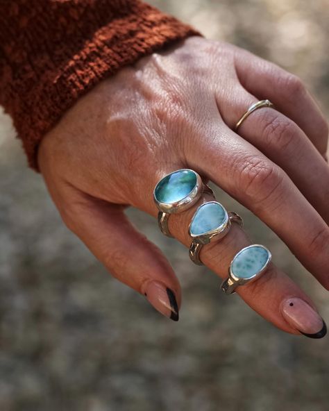 If the ocean wore rings🌊✨ From bottom to the top: Santa Maria Aquamarine, the birthstone for March. Aquamarine is Latin for “SEAWATER”. Larimar, found in the Dominican Republic. Known for its beautiful blue coloring and almost tie-dye look with white throughout. Both of these Larimar stones were cut by me, in my Northern California studio.  VALOR Collection 9/24 at 10am pst . . . . . #sustainablejewelry #bohojewelry #smallbusiness #riojeweler #jewelryobsessed #bohovibes #goddessjewelry Goddess Jewelry, Larimar Rings, Larimar Jewelry, Larimar Stone, The Dominican Republic, Sustainable Jewelry, March Birth Stone, Summer Jewelry, Santa Maria