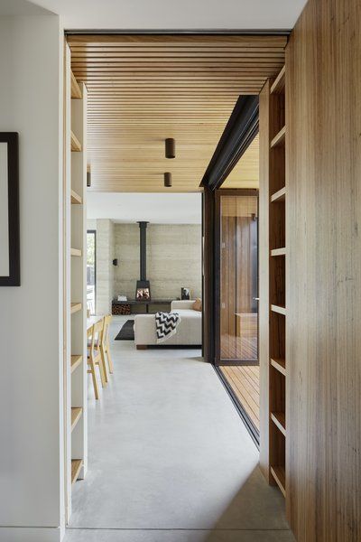 Photo 12 of 23 in An Inky Black Melbourne Home Draws Its Hue From the Ironbark Eucalyptus - Dwell Melbourne Architecture, Melbourne Home, Timber Battens, Rammed Earth Wall, Timber Ceiling, Dining Room Ceiling, Rammed Earth, Melbourne House, Energy Efficient Design