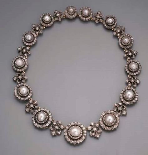 A FINE ANTIQUE PEARL AND DIAMOND NECKLACE. Circa 1870. Property of Lady Guendolen Talbot (d. 1937), daughter of Charles, 19th Earl of Shrewsbury (1830-1877) and his wife Teresa (d. 1912), daughter of Commander Richard Howe Cockerell R.N. She married firstly Colonel Edward Chaplin (d. 1883), M.P. for Lincoln (d. in 1877), and secondly in 1887, Major Archibald Cosmo Little (d. 1934), 5th Lancers, of the Upton House Tetbury, Gloucestershire. Jewellery Kundan, Bijoux Art Deco, Jewellery Shops, Diamond Necklace Designs, Pearl And Diamond Necklace, Necklace Ring, Antique Necklace, Royal Jewelry, Diamond Pendant Necklace