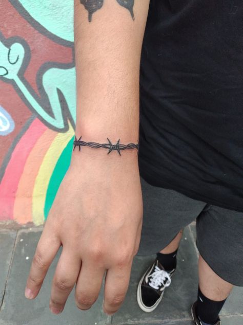 Barbed Wire Tattoo Around Wrist, Barbed Wire Arm Tattoo Women, Barbed Wire Tattoo Simple, Barbwire Band Tattoo, Barb Wire Bracelet Tattoo, Barb Wire Around Wrist Tattoo, Tattoo Ideas For Men Barb Wire, Barbwire Bracelet Tattoo, Wrist Barbed Wire Tattoo