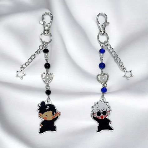 Celebrate your love for anime with this handmade Gojo & Geto keychain, a one-of-a-kind accessory inspired by your favorite characters. Designed with attention to detail, this keychain features Gojo and Geto in a unique and playful Y2K aesthetic, blending nostalgic early 2000s style with anime fandom. Whether you're a collector, anime fan, or simply looking for a standout accessory, this keychain is the perfect way to personalize your keys, bags, or backpacks with a touch of your favorite charact Bag Keychain Aesthetic, Keychain Y2k, Anime Keychains, Early 2000s Style, Anime Jewelry, 2000s Style, Iphone Case Stickers, Anime Fandom, Anime Gifts