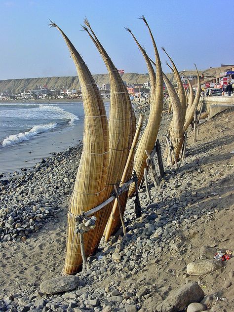 Caballitos - straw boats used by fishermen stored on Huanchaco Beach, Trujillo, Peru Peru Beaches, Trujillo Peru, Port Town, Inca Empire, Lake Titicaca, Peru Travel, Lima Peru, South America Travel, Watercraft