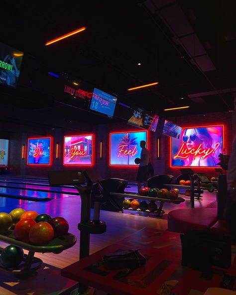 Bowling alley, neon lights, arcade vibes, colorful bowling balls, nightlife fun, retro glow, vibrant aesthetic, feel lucky, game night, urban entertainment, lit atmosphere, playful energy, friends night out, neon dreams, electric fun. Bowling Alley Aesthetic, Alley Aesthetic, Neon Bowling, Miami Neon, Arcade Aesthetic, Vibrant Aesthetic, Friends Night, Bowling Games, Bowling Balls