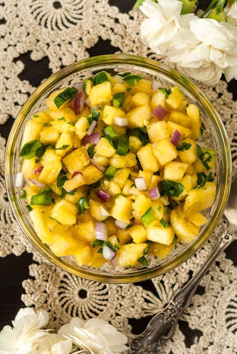 This pineapple jalapeño salsa recipe is a spicy, tropical sensation! Serve it with chips or use it to top your tacos, nachos or favorite colorful recipes. With just 5 ingredients and 20 minutes of your time, this delightful salsa will be ready to serve and impress your guests! Jalapeno Salsa Recipe, Jalapeño Salsa, Colorful Recipes, Easy Christmas Dinner, Elegant Appetizers, Apple Peeler, Pineapple Salsa, Pork Meat, Lovely Home