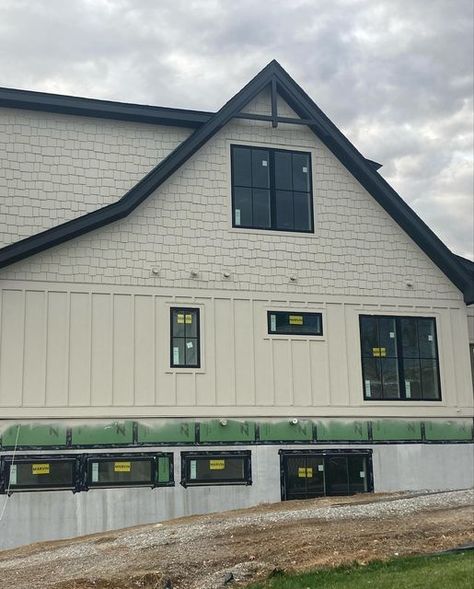 Ivey Custom Homes on Instagram: "Our custom lake cottage is wrapping up with fine details. #superiorwalls #jameshardiesiding #customhomes #instagood #instagram #marvinwindows" Shaker Siding Accent, White Siding With Shaker Accent, Board And Batten With Cedar Shakes, Vertical Siding With Shakes, Shaker Siding In Peaks, Shaker Siding, Superior Walls, James Hardie Siding, Ranch House Exterior