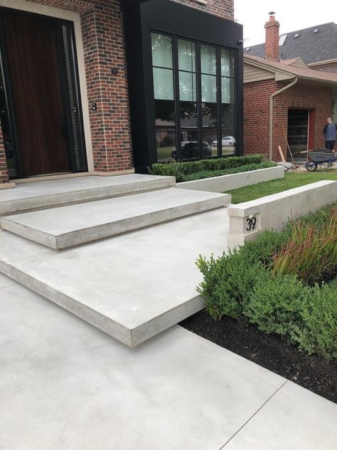 Limestone finish modern concrete... | Review of DMG Concrete Design & Finish | HomeStars Limestone Front Steps, Side Walkway Ideas, Back Patio Steps, Footpath Ideas, Front Porch Stone Steps, Front Door Stairs, Feature Stairs, Floating Steps, Front Porch Stone