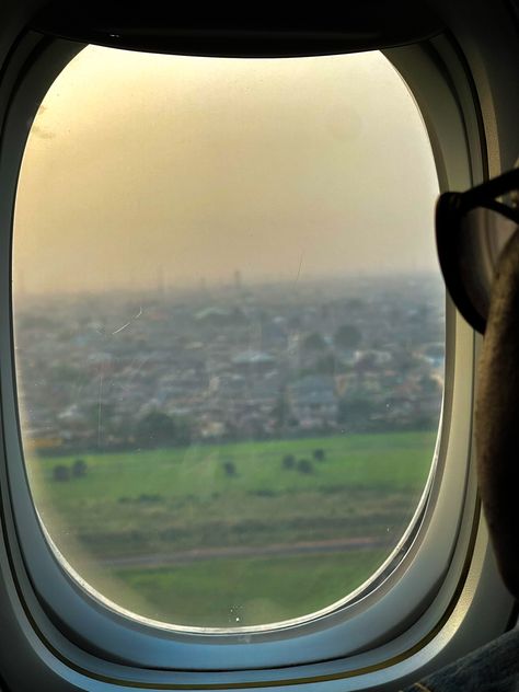 Airplane Landing View of Nigeria with someone staring out of the window Airplane Landing, Airplane Window View, Airplane Window, Window View, A Plane, Sky Aesthetic, Airplane View, Pins, Quick Saves