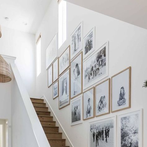 Pure Salt Interiors on Instagram: "My personal favorite room in my #casalincoln home is the entryway, which features a gallery wall with all of our favorite family photos. 🤍 To avoid worrying about the coloration or style of the images competing with one another, I chose black and white prints to keep things cohesive while showcasing the timeline of my family through generations and occasions! Then I experimented with different frame possibilities (I loved mixing the wood and white!). and then Family Timeline Wall, Family Photo Wall Collage, Decorating My First Apartment, Salt Interiors, Pure Salt Interiors, Garage Storage Inspiration, Unique Framing, Picture Gallery Wall, Pure Salt