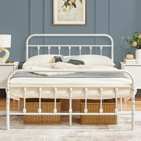 If you are looking for a practical bed frame with a vintage look, this iron platform bed could be a good choice. Inspired by the traditional entrance gates, this bed is crafted of curved lines and round corners in a matte black finish, creating an elegant and warm tone. The bed is crafted with a metal slatted frame for solid support and long-term durability. Cleaning will be super easy, just wipe clean with a soft cloth. The high headboard can protect your head and provide you with a space to si White Metal Bed Frame Bedroom Ideas, White Iron Bed Frame, White Iron Beds, White Metal Bed Frame, White Metal Bed, Farmhouse Style Bedding, Vintage Bed Frame, High Headboard, Bed Platform