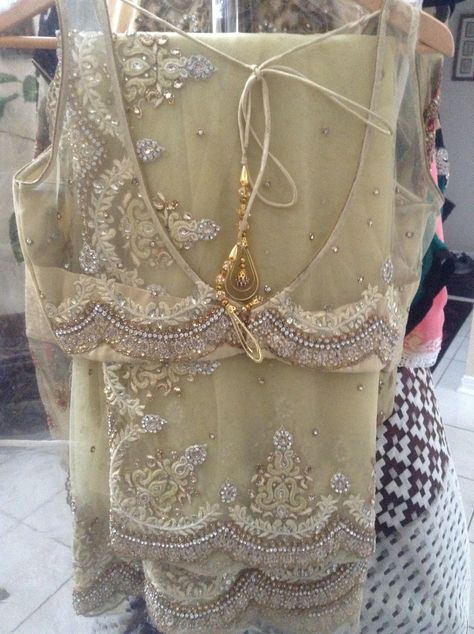 Designer saree on net with stitched blouse in beige colour . Plain Net Blouse Designs, Gold Net Saree, Blouse Design Back Neck, Net Blouse Design, Blouse Design Back, Saree Satin, Plain Blouse Designs, Simple Gown, Netted Blouse Designs