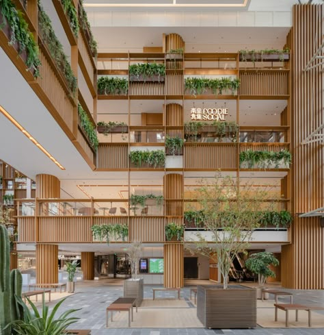 AIM Architecture turns Xintiandi shopping mall atrium into plant-filled plaza Atrium Design, Outdoor Paving, Wooden Trellis, Mall Design, Renovation Design, Shopping Malls, Modern City, Sustainable Architecture, Architecture Photo