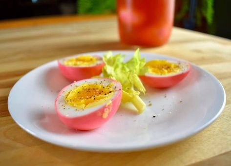 This is more of a guide than a recipe, with no real quantities. You basically hard boil some eggs, then cover them with pickle juice and Clamato juice and let them hang out for a couple days. This results in beautifully rosy, delicious pickled eggs, reminiscent of the famous Canadian brunch cocktail, the mighty Caesar! Pickled Eggs Recipe, Eggs Recipes, Pickled Eggs, Pickled Garlic, Homemade Pickles, Brunch Cocktails, Pickle Juice, Dill Pickle, Hard Boiled