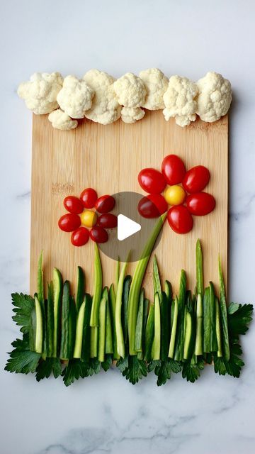 Megan Ruffles on Instagram: "Flower Veggie Board 🥒 🌸   This is so simple to put together but is sure to impress your guests! It’s *almost* too cute to eat.   You will need: Cucumber Parsley  Celery  Tomato  Cauliflower  #grazingboards #grazingboard #veggieboard #crudités" Veggie Charcuterie Board, Veggie Charcuterie, Veggie Board, Spring Appetizers, Ruffle Flower, Charcuterie Boards, Too Cute, Charcuterie Board, Appetizer Snacks