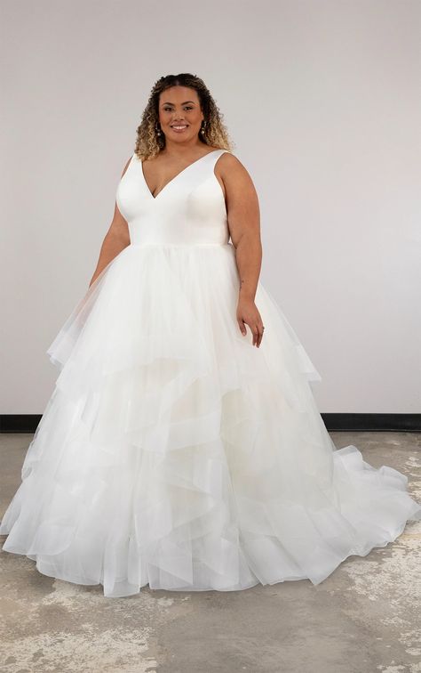 Essense Style D4012: A refined plus size ballgown wedding dress with sleek straps, V-neckline, and dreamy tulle skirt, perfect for the modern princess bride. Plus Size Ballgown Wedding, Plus Size Ballgown, Princess Plus Size, Tulle Ball Gown Wedding Dress, Princess Ballgown, Ballgown Wedding Dress, Pregnant Lady, Ballgown Wedding, Essense Of Australia