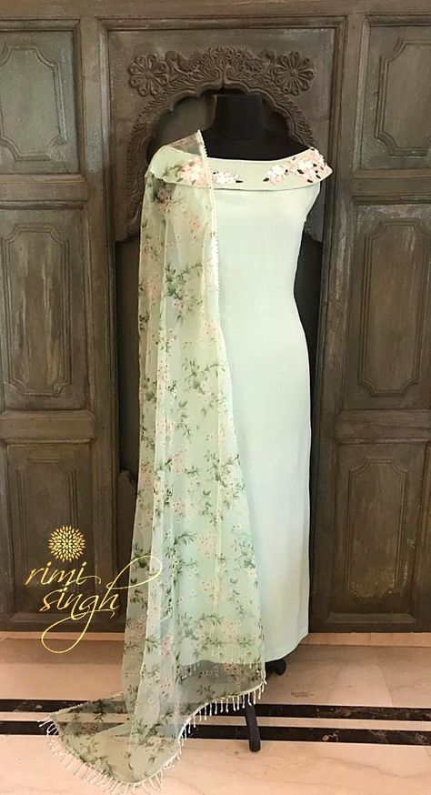 "The biggest source of motivation are your own thoughts , so think big and motivate yourself to win."  Pista green off-shoulder crepe kurta with hand embroidery on the neckline paired with matching cotton lycra pants and a silk organza dupatta with floral motifs.  Available exclusively at  Rimi Singh Studio A 999 Sushant Lok 1  Gurgaon  #9818310054. Pista Green, Churidar Designs, Salwar Dress, Salwar Designs, Long Kurti Designs, Pakistani Dresses Casual, Kurta Neck Design, Salwar Kamiz, Dress Neck Designs