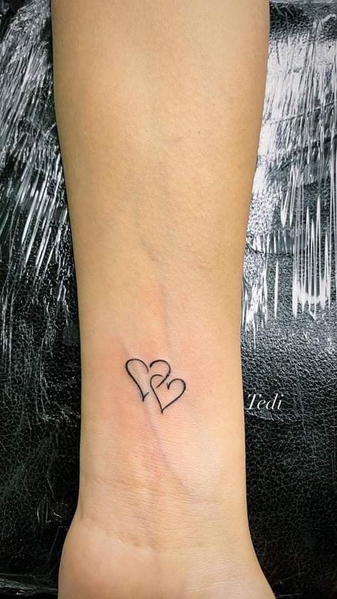 Small 2 Heart Tattoo, Hart Tattoo Design Small, Small Heart Tattoo On Wrist Mother Daughters, Double Heart Wrist Tattoo, Tattoo Ideas Female Initials, Heart Tattoo For Mom And Daughters, Double Heart Tattoo With Initials, Two Love Heart Tattoo, Small Lovers Tattoo