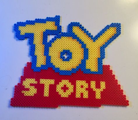 Perler bead toy story logo Toy Story Perler Bead Patterns, Perler Bead Logos, Toy Story Perler Beads, The Claw Toy Story, Hama Disney, Story Logo, Toy Story Crafts, Melty Bead Designs, Melt Beads