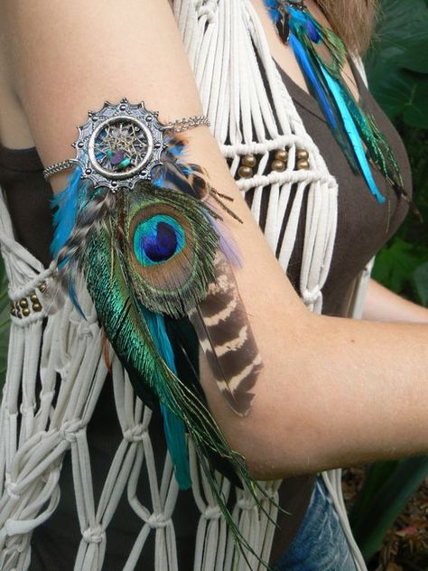 arm chain peacock pheasant feather dreamcatcher arm chain armlet in native american inspired tribal boho belly dancer and hipster style on Etsy, $38.50: Peacock Pheasant, Moda Hippie, Pheasant Feather, Estilo Hippy, Purple Feather, Estilo Hippie, Feather Crafts, Feather Jewelry, Festival Jewelry