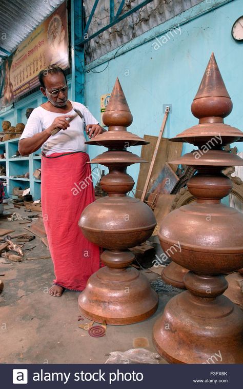 Download this stock image: Brass temple Gopura Kalasam making at Swamimalai near Kumbakonam ; Tamil Nadu ; India - f3fx6k from Alamy's library of millions of high resolution stock photos, illustrations and vectors. Kalasam Images, Temple Painting, Lakshmi Pooja, Pooja Decor, Traditional Sculptures, Temple Bells, Mandir Design, Copper Work, Indian Art Gallery