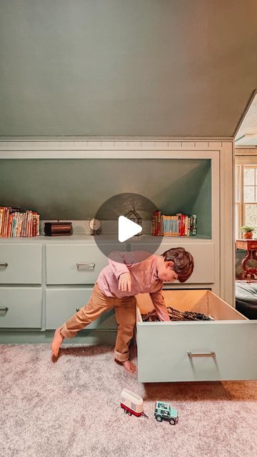 Laura Avery | DIY & Home on Instagram: "Follow as we transform this cottage room by room

Adding this built in added so much sf to the room, because we could take out all the shelves and toy chest that were on the ground. 

Would you like a full tutorial on how we made this builtin? 

#1930srenovation #playroom #builtins #diy #womenwhodiy" Converted Attic Playroom, Kids Storage Ideas For Toys, Attic Playroom Ideas Sloped Ceiling, Kids Toys Storage Ideas, Attic Built Ins, Attic Playroom Ideas, Converted Attic, Bedroom Attic Ideas, Bonus Room Above Garage