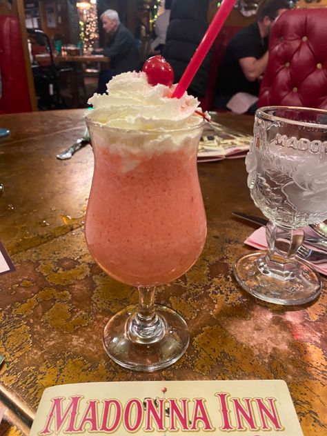 The pink cloud cocktail at Madonna Inn in San Luis Obispo, CA. #cocktails #madonnainn #sanluisobispo #california #drink #summer #aesthetic Madonna Inn Aesthetic, Cloud Cocktail, Pink Champagne Cake, Madonna Inn, Champagne Cake, Friend Stuff, Pink Cloud, Dream Trip, Heart Shaped Sunglasses