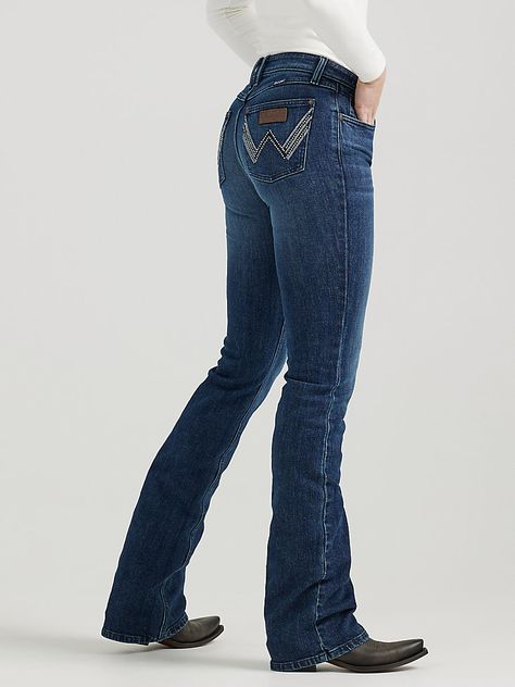 A BOOTCUT BRIMMING WITH RETRO VIBESMae places a contemporary twist on our cowgirl cool aesthetic. All Wrangler® jeans for women are designed to accentuate your best assets, but our women's Retro® jeans go above and beyond. Wrangler® Retro® jeans pay tribute to our Western heritage with the iconic details you know and love, including the leather patch and authentic W stitching on the back pockets. Plus, these women's bootcut jeans come with a figure-flattering, mid-rise fit that's truly versatile. With a variety of washes to choose from, you can easily make this throwback jean an everyday staple. Bell Bottom Jeans Outfit, Cool Aesthetic, Workwear Jeans, Retro Jeans, Womens Jeans Bootcut, Bootcut Jean, Outdoor Pants, Work Wear Women, Jeans For Women