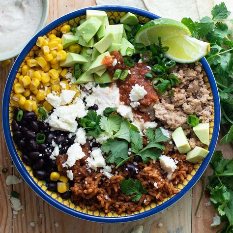 Turkey Burrito Bowl Turkey Burrito Bowl, Ground Turkey Black Beans, Healthy Burrito Bowl, Creamed Turkey, Rice Healthy, Lime Crema, Spanish Rice, Seasoned Rice, Burrito Bowl