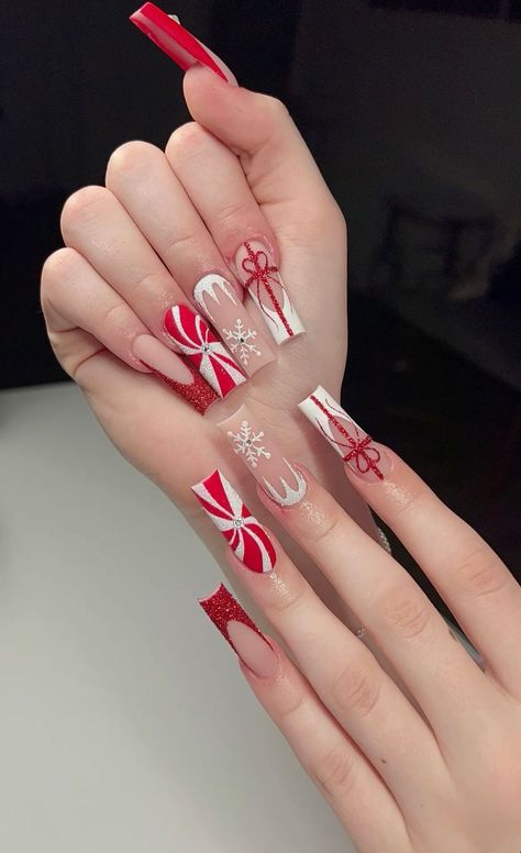 Nail your holiday look with these beautiful Christmas nail art ideas! 💅 Discover tips and tricks for recreating eye-catching designs that will make your fingertips festive and fun! #NailGoals #ChristmasStyle Christmas Nails Acrylic Medium Length, Acrylic Nails Coffin Christmas, Coffin Shaped Christmas Nails, Christmas Nails Extra, Nails Christmas Coffin, Short Christmas Acrylic Nails, Christmas Nails Red And White, Extra Christmas Nails, Extravagant Nails