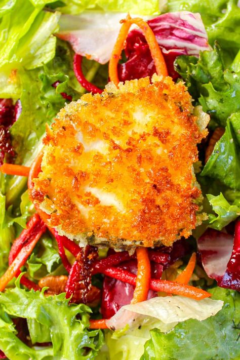 This simple goat cheese salad stars a round of goat cheese, breaded and fried to a golden brown, then nested on dressed greens. Pretty, creamy, tangy and crunchy. Vegetable Strudel, Mesclun Salad, Cheese Salad Recipes, Fried Goat Cheese, Goat Cheese Recipes, Simple Vinaigrette, Beetroot Salad, Salad Toppings, Large Salad Bowl