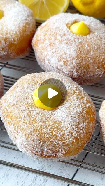 Theresa Marie Krunev on Instagram: "Lemon Curd Donuts 🍋😋

Ending our Lemon series with these delicious Lemon Curd Donuts. We love the fried outside and the super soft inside! Full recipe below.

Ingredients
Dough: 
* 3 1/2 cups all-purpose flour  * 1/2 cup sugar * 2 1/4 tsp rapid-rise yeast, standard package  * 1 tsp cinnamon * 8 tbsp unsalted butter, softened, cubed * 1/2 cup milk, warm   * 3 eggs  * 1 tsp vanilla extract  * 1/4 tsp salt  * For frying 6 cups vegetable oil
Filling:
* 3.4 oz box vanilla pudding
* 1 cup of milk 
* 1 cup lemon curd 
* 1 lemon, zested 
Topping:
* 1 cup of sugar
Directions
* Dough: combine flour, sugar, cinnamon, and rapid rise yeast in a bowl of a stand mixer, whisk together. Scatter softened butter on top of dry ingredients. Ensure milk is at 110°F and comb Lemon Curd Sticky Buns, Lemon Curd Doughnut, Lemon Blueberry Donuts With Lemon Glaze, Baked Lemon Doughnuts With Lemon Glaze, Lemon Glazed Donuts, Cup Of Milk, Breakfast Sweets, 3 Eggs, Vanilla Pudding