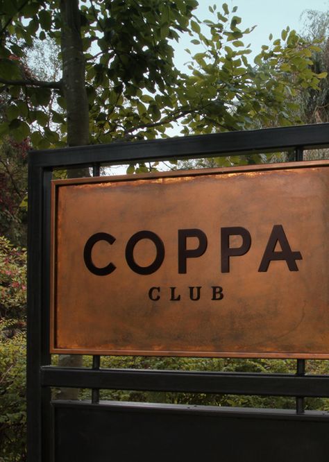 Coppa Club - The non-members, members club | The Plant Business Sign Ideas Outdoor, Apartment Signage Exterior, Wooden Signage Design Outdoor, Copper Signage, Sign Design Outdoor, Business Signs Outdoor Signage, Winery Entrance, Neighborhood Signage, Farm Signs Entrance