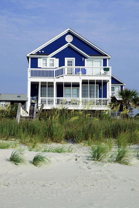 Don’t get ‘tide’ down in hidden fees and lack of privacy! Consider ShoreSummerRentals.com to fulfill all of your beach house rental needs! #BoycottVRBO #listyourrental #beachrentalowner #beachhouseforrent Blue Beach House Exterior, Coastal Cottage Plans, House Plans On Stilts, Stilt House Plans, Elevated House Plans, Coastal Home Plans, Blue Beach House, Coastal Homes Plans, Florida Beach House