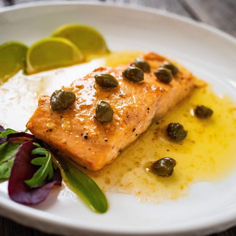 Salmon with Caper –Garlic Butter Caper Butter Sauce, Caper Butter, Garlic Clove, Lemon Slice, Salmon Fillets, Butter Sauce, Just Cooking, Garlic Butter, Freshly Ground