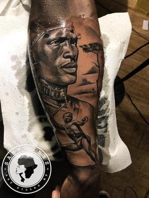 20 Powerful Africa Tattoos | Tattoodo Sankofa Tattoo, African Warrior Tattoos, African Sleeve Tattoo, Dark Skin Tattoo, Black Men Tattoos, African Warrior, Africa Tattoos, Chicanas Tattoo, African Tattoo