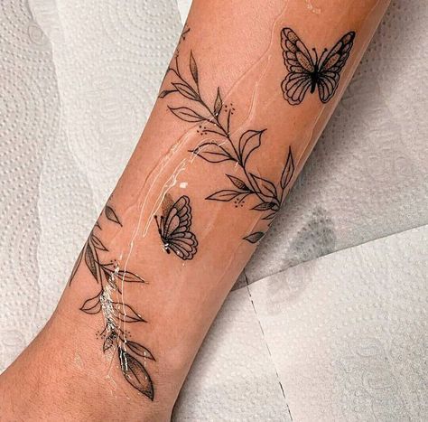 Bible Imagery Tattoos, Forearm Tattoo Women Wrap Around, Butterfly Arm Tattoos For Women Sleeve, Wrap Around Leaves Tattoo, Sunflower Wrap Around Tattoo, Pretty Forearm Tattoos For Women, Wrap Around Forearm Tattoo Women, Tattoo Ideas Foot, Wrap Around Wrist Tattoos