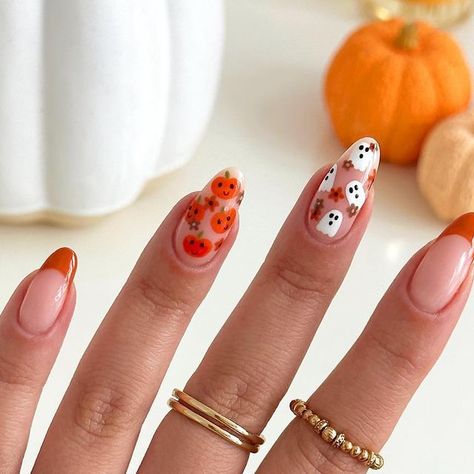 Abi Markey on Instagram: "autumnal/halloween mani 👻🎃🍂 Using @the_gelbottle_inc BIAB 19 Fall, Khaki, Brunette, Chocolate& Pumpkin White and black detail paints @homeofnailart @nails_luxeofficial liner brush I @officialnavyprofessional nail prep Drenched in pumpkin spice cuticle oil ofc 😮‍💨🤤🎃🍂 @nafstuff . ——————- #halloweennails #floralghost #ghostnails #halloweennailart #autumnnails #thegelbottleinc #navypro #showscratch #pumpkinnails #frenchmani #floralnails #biab #cutehalloween #autumna Pumpkin Biab Nails, Cute Halloween Nails Pumpkins, Autumn Nails Halloween, Pumpkin Cherry Nails, Intro To Fall Nails, Halloween Nails Pumpkin Design, Fall Nails Pumpkins, Fall Nail Art Square, Halloween Biab Nails