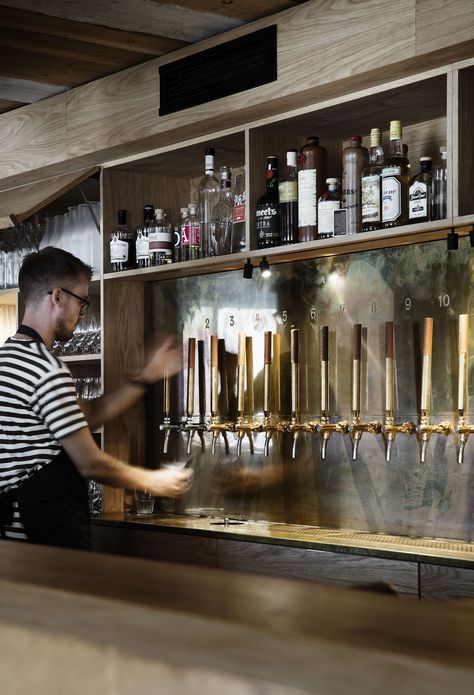 The bar serves up a wide range of wine, beer, spirits and aquavits. Beer Taps Design, Taphouse Design, Brewery Interior Design, Greece Restaurant, Bar Reference, Copenhagen Restaurant, Back Bar Design, Brewery Bar, Bar Deco